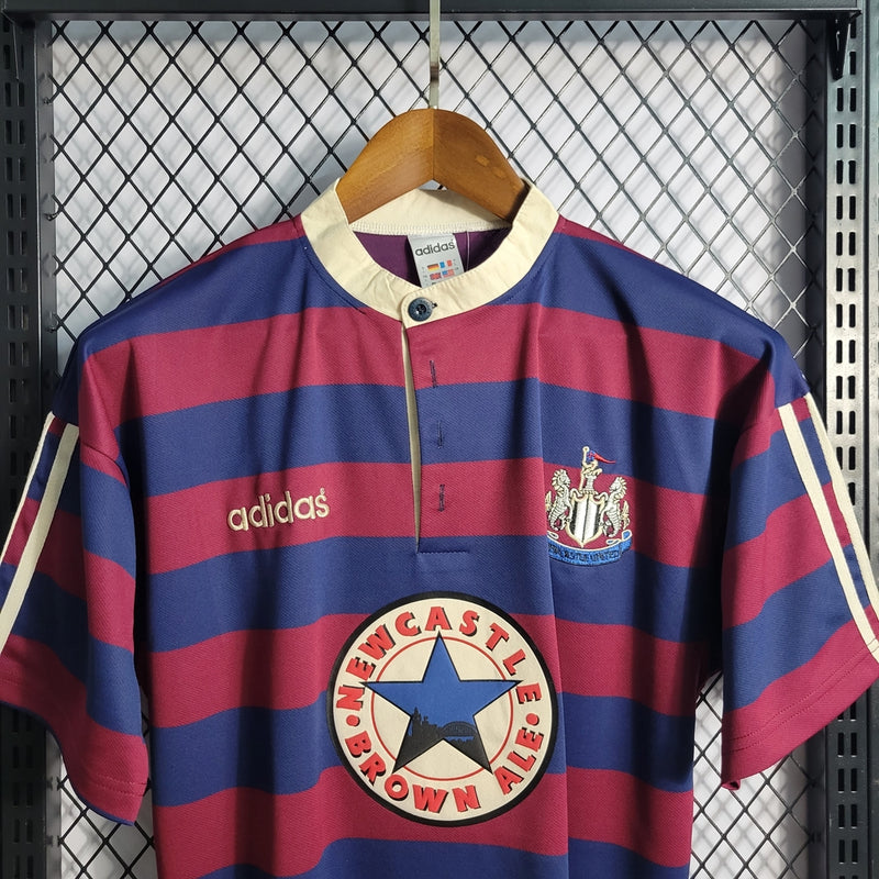 Camisa Retrô Newcastle II Away 1995/97 - Masculina - Modelo Torcedor - Grená e Azul