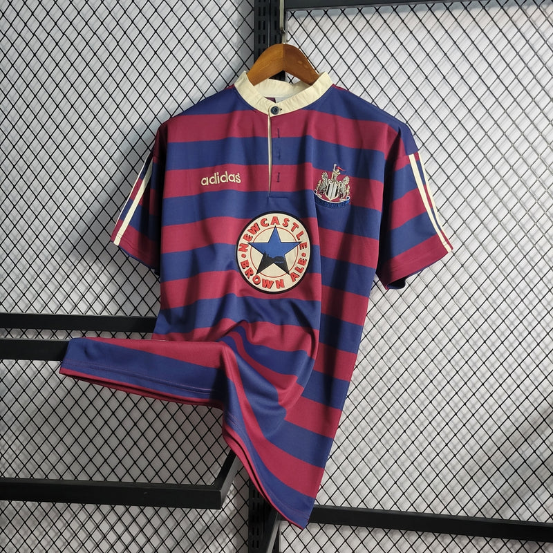 Camisa Retrô Newcastle II Away 1995/97 - Masculina - Modelo Torcedor - Grená e Azul